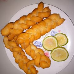A picture of Lemon flavored braided mandazi.