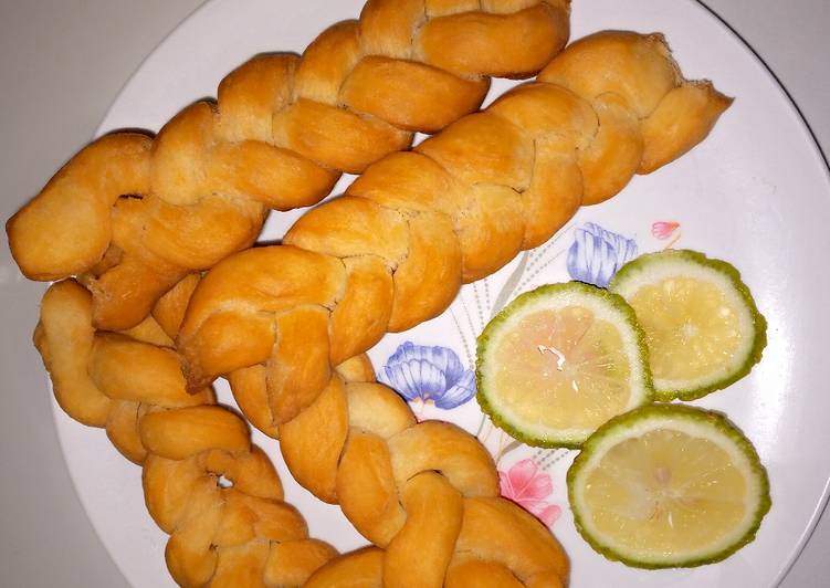 Simple Way to Prepare Super Quick Homemade Lemon flavored braided mandazi