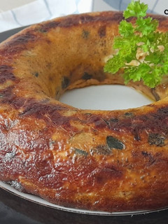Una foto de Tortilla de calabacín, al horno, rellena de salmón y queso