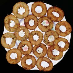 A picture of Crispy Potato rings.