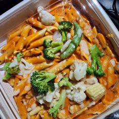 A picture of Red sauce indian style penne pasta.