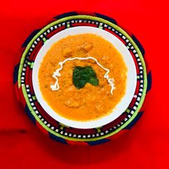Butter chicken 🐓 with garlic naan A picture of Butter chicken 🐓 with garlic naan.