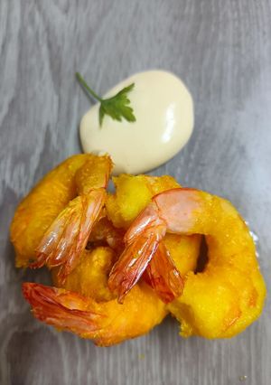 Una foto de Langostinos en masa orly