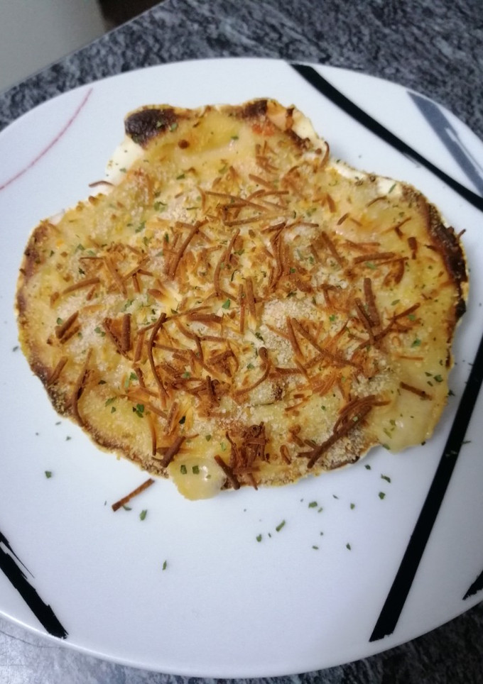 Una foto de Vieiras rellenas gratinadas