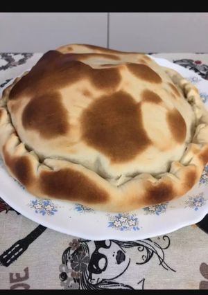 Una foto de Pizza con tapa