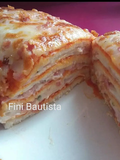 Una foto de Pastel con pan de molde sabor pizza