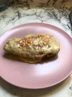 Una foto de Calabacín relleno de soja texturizada