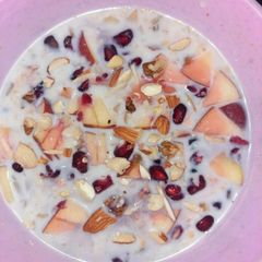 A picture of Hearty Oat Bowl with Seeds and Fruits.