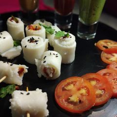 A picture of Dhokla sushi.