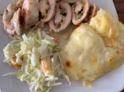 Una foto de pechugas de pollo rellenas