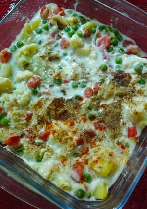 A picture of Baked vegetable in white sauce.