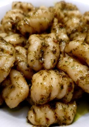 Una foto de Ñoquis al pesto