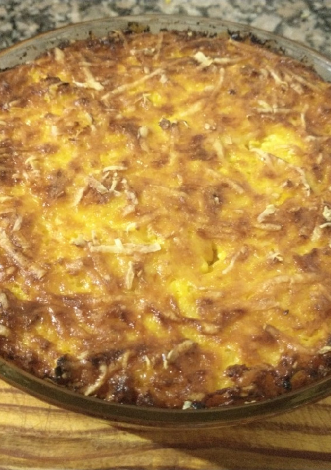 Una foto de Chipa Guazú o Pastel de Choclo 🌽🌽