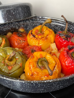 A picture of Gemista 🇬🇷 Greek Stuffed Vegetables (Tomatoes, Peppers, and Potatoes).