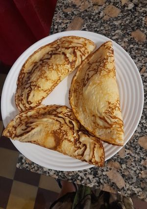 Una foto de Crepas de papa rellenas con carne picada, cebolla y queso