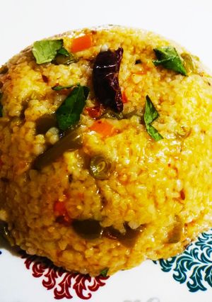 A picture of Broken wheat upma.