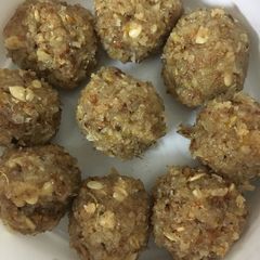 A picture of Coconut and dry fruits laddo.