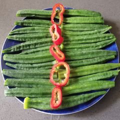 A picture of Steamed Okra with Red Pepper.