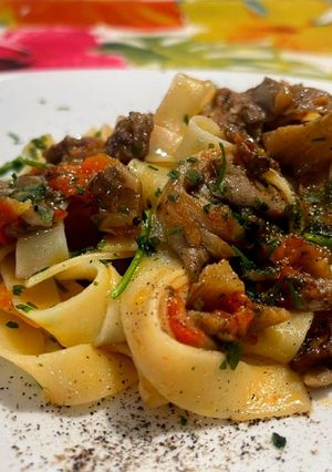 A picture of Tagliatelle with Oyster Mushrooms and Fresh Tomatoes.