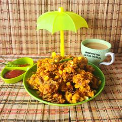 Corn Capsicum Onion Mix Fritters - Mouthwatering Monsoon Munching A picture of Corn Capsicum Onion Mix Fritters - Mouthwatering Monsoon Munching.