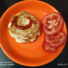A picture of Bread omlette sandwich.