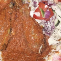 A picture of Just salad and chicken stew.