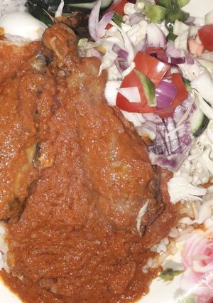 A picture of Just salad and chicken stew.