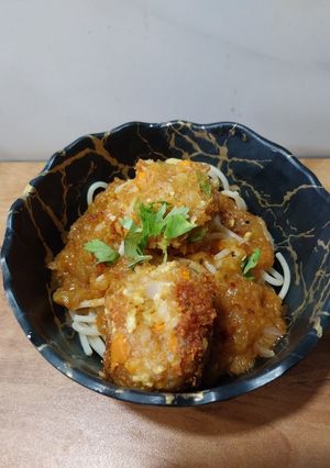 A picture of Spaghetti with pumpkin sauce and Veg Balls.