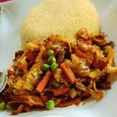 Shredded chicken sauce with couscous A picture of Shredded chicken sauce with couscous.
