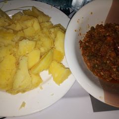 A picture of Boiled Irish potatoes with Egg Sauce.