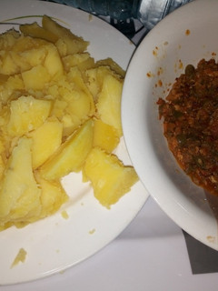 A picture of Boiled Irish potatoes with Egg Sauce.