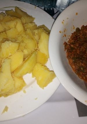A picture of Boiled Irish potatoes with Egg Sauce.
