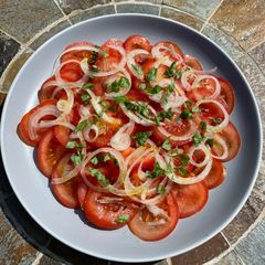 A picture of Tomato & Onion Salad for BBQs.