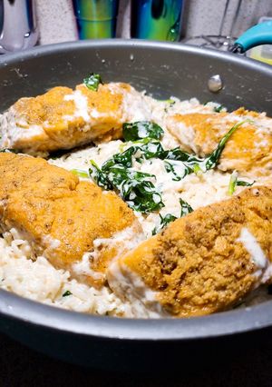 A picture of Fried Salmon with Garlic Rice.