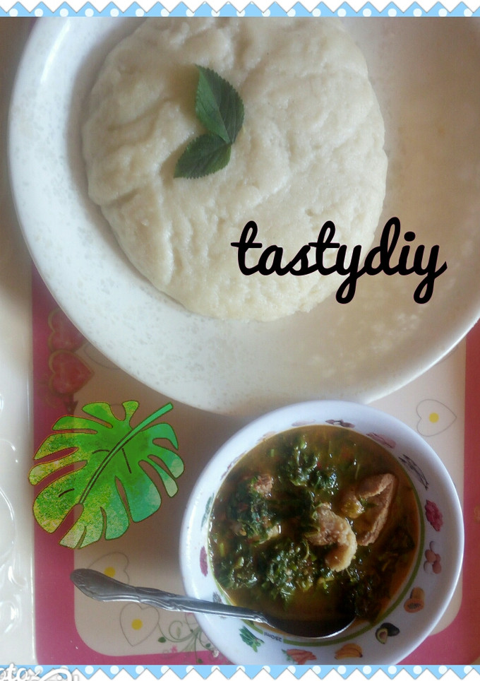 A picture of Vegetable soup with swallow.