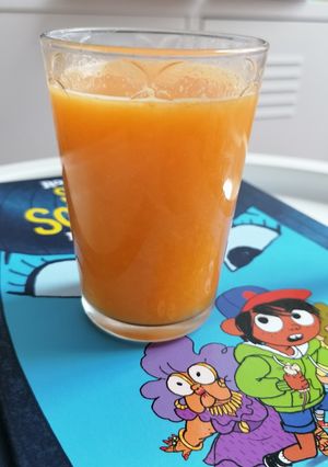 Une photo de Jus orange citron vert carotte