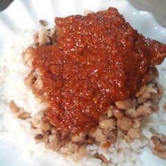 Rice and beans with stew A picture of Rice and beans with stew.