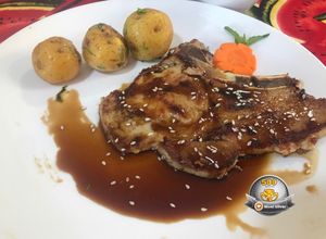 Una foto de Chuleta de cerdo teriyaki
