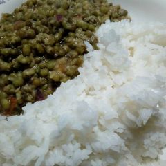 A picture of Green grams (ndengu) stew with rice.