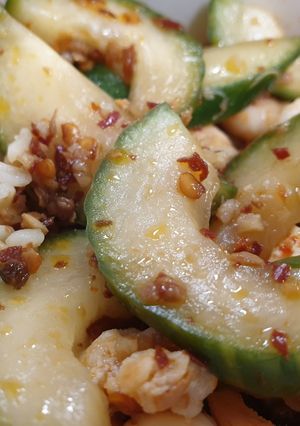 A picture of SMASHED CUCUMBER 🥒 SALAD.