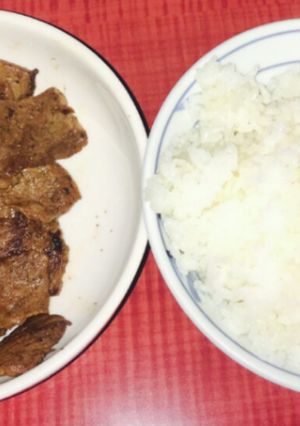 A picture of Barbecue beef with rice.
