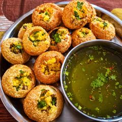 Crispy Pani Puri (Gol Gappa) with Spicy Tangy Water A picture of Crispy Pani Puri (Gol Gappa) with Spicy Tangy Water.
