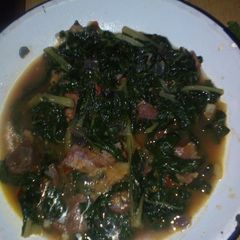 A picture of Spinach and meat.
