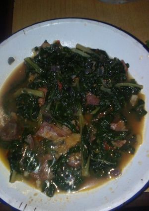 A picture of Spinach and meat.