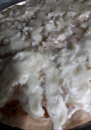 Una foto de Pizza de cebollas