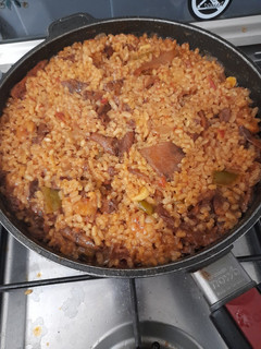 Una foto de Arroz semi integral con níscalos y gambas