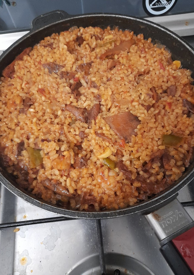 Una foto de Arroz semi integral con níscalos y gambas