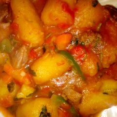 A picture of Matoke and beef.