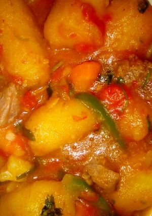 A picture of Matoke and beef.