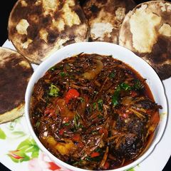 A picture of Roasted New Yam and Ukana with 4 lives Sauce.😂😁😀.